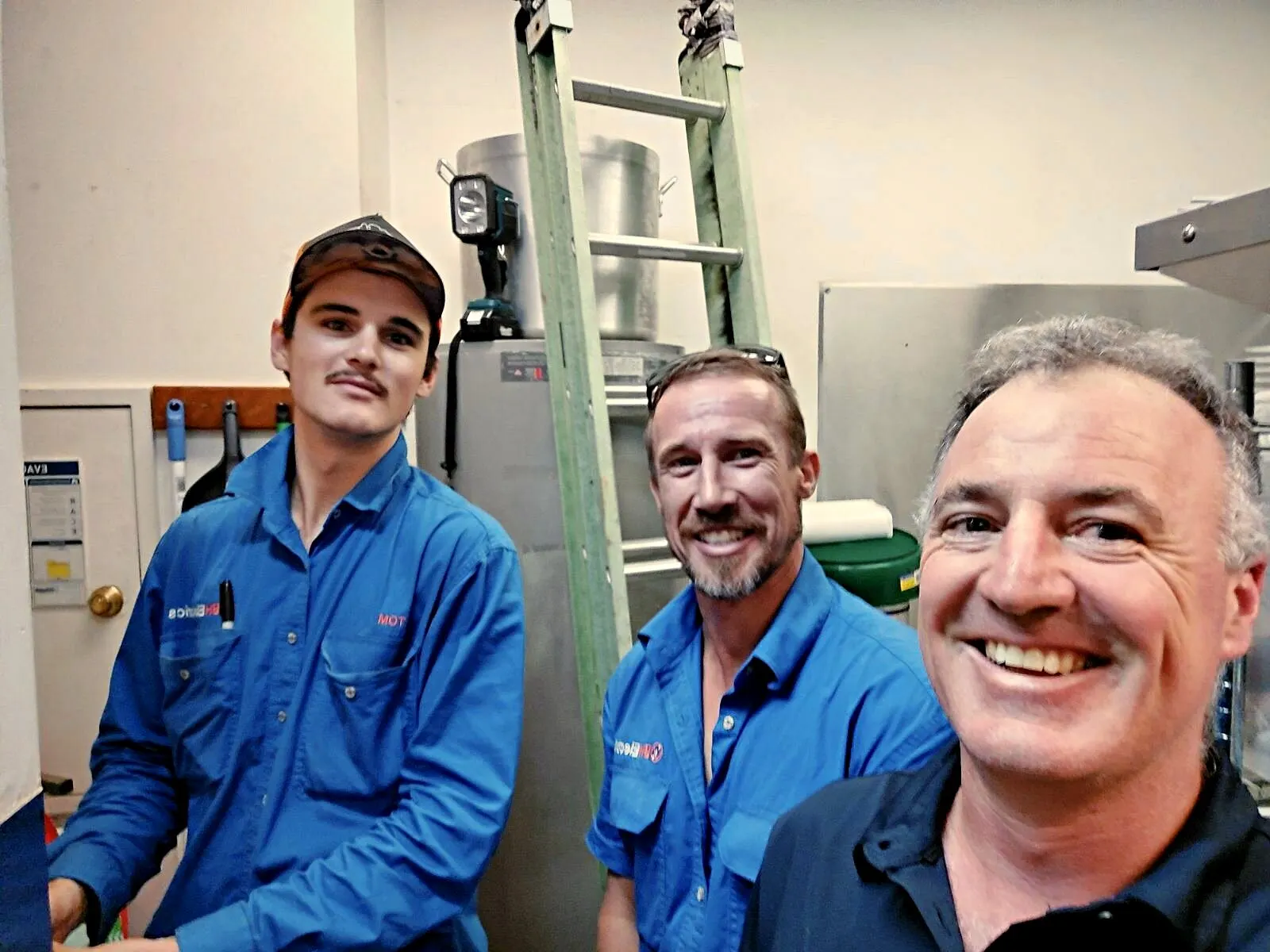 BH Electrics apprentices and Brad in a Port Douglas switchroom