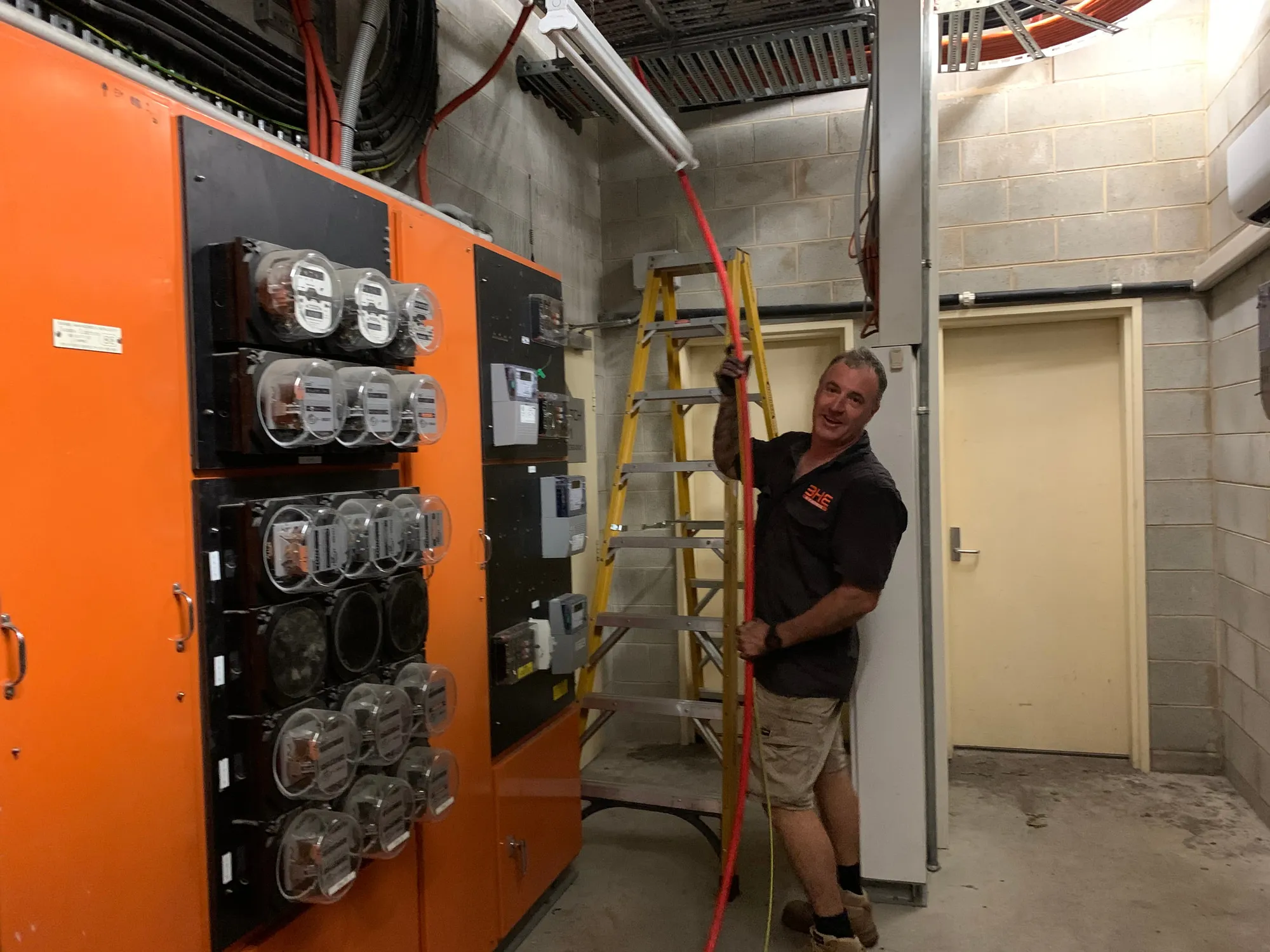 A bank of commercial meters in a Port Douglas building