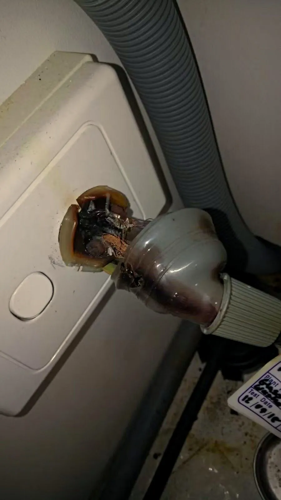 A ceiling fan motor corroded by coastal salt air