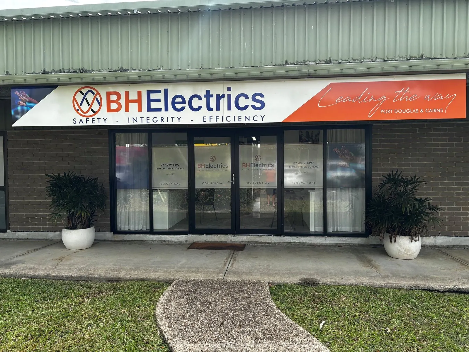 The BH Electrics shopfront at Craiglie on the Captain Cook Highway, signwritten with the phone number, website and licence number