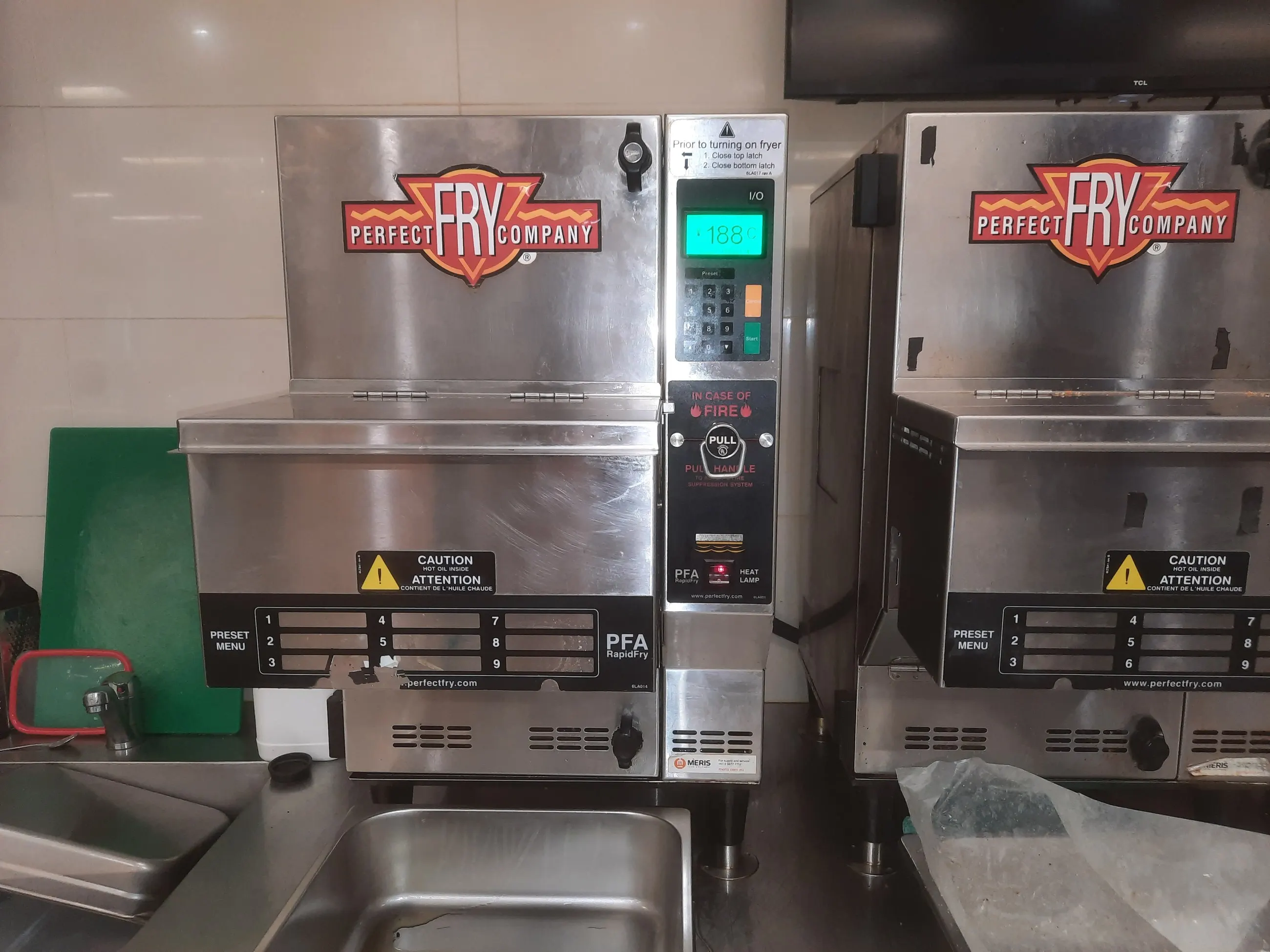 Commercial fryers wired in and ready for handover in a Port Douglas kitchen