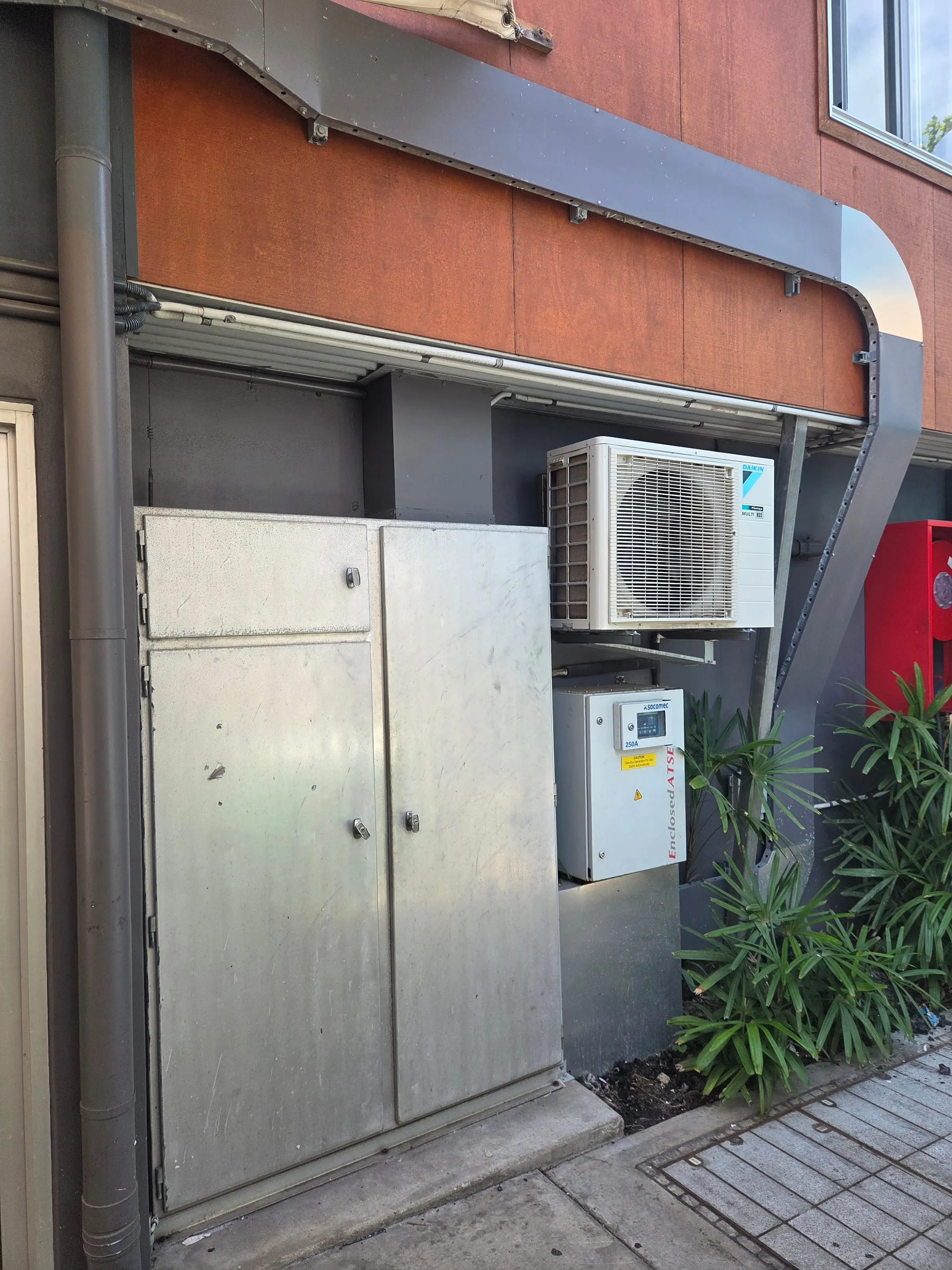 The main switchboard cabinet at Rattle and Hum, Port Douglas, with the 250A automatic changeover beside it